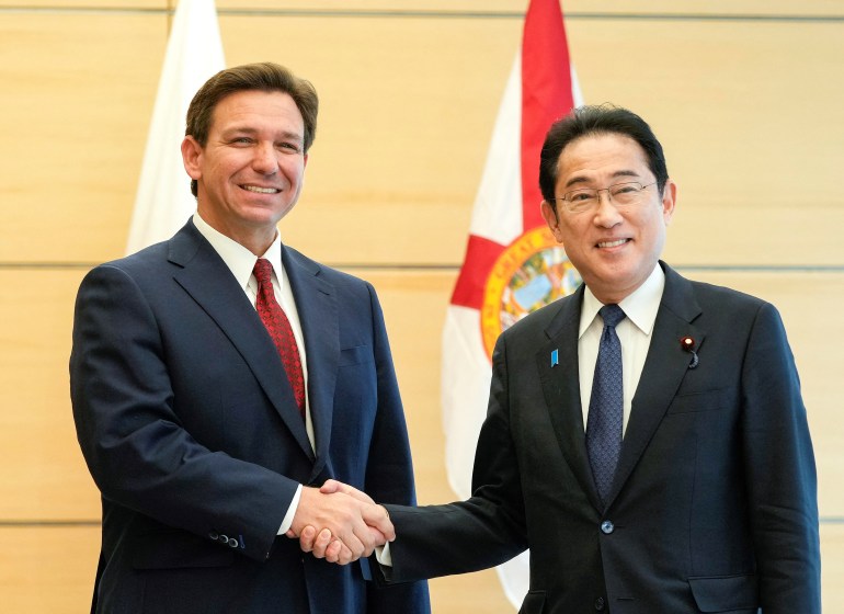 Florida Governor Ron DeSantis meets with Japanese Prime Minister Fumio Kishida. They smiled and shook hands.