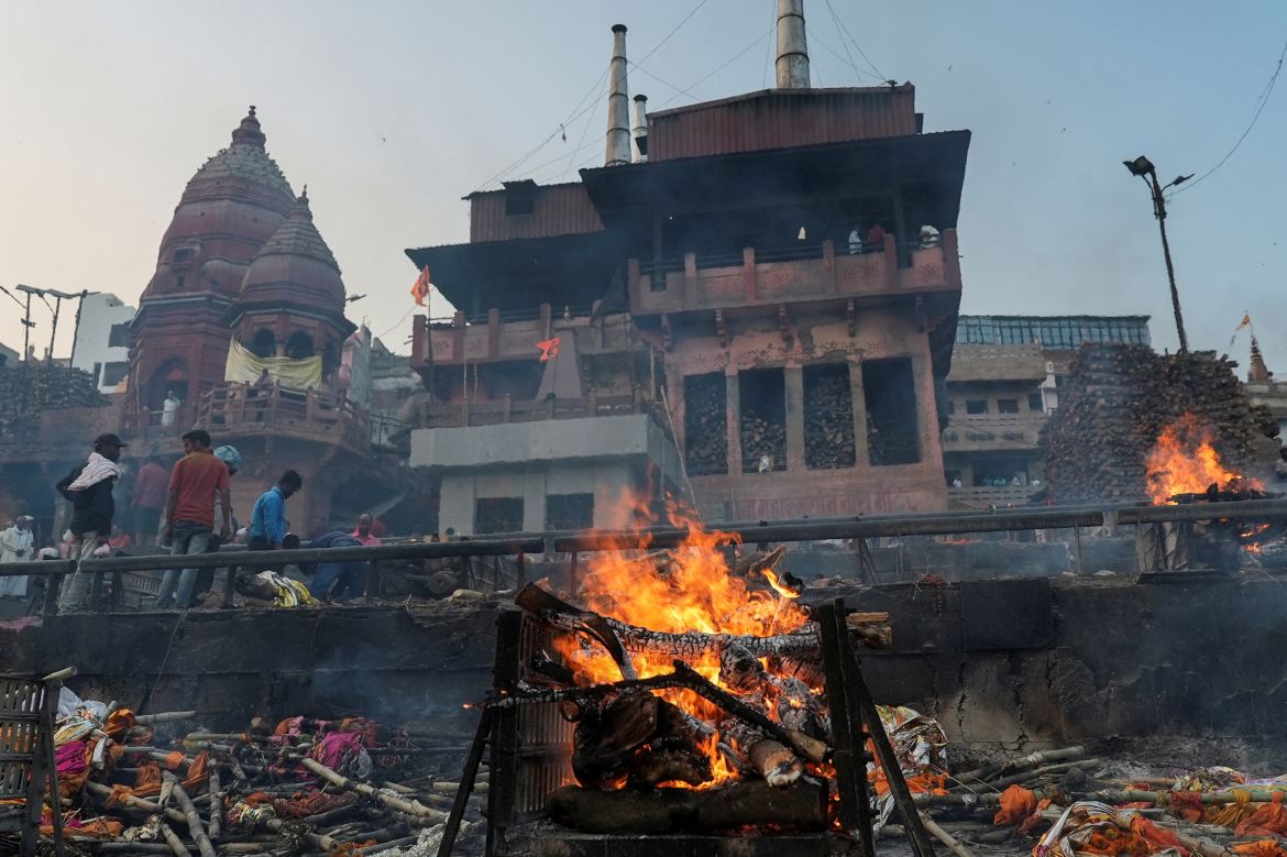 Fires burn at Manikarnika Ghat, an ancient crematorium lying on the shores of the Ganges, in Varanasi, India