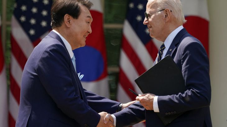 US President Joe Biden and South Korea's President Yoon Suk Yeol shake hands at the conclusion of a joint news conference in the Rose Garden of the White House