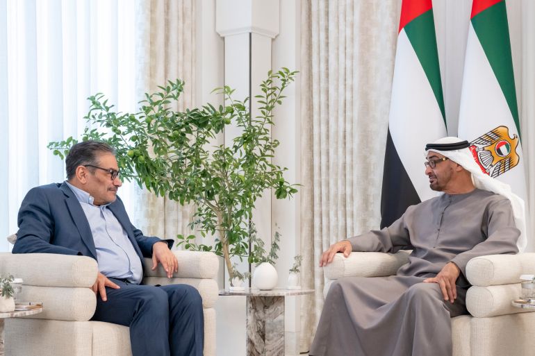 Emirati President Sheikh Mohamed bin Zayed al-Nahyan (R) during a meeting with the Secretary of Iran's Supreme National Security Council Ali Shamkhani in Abu Dhabi on March 16, 2023 [Photo by Hamad AL-KAABI / UAE PRESIDENTIAL COURT / AFP]