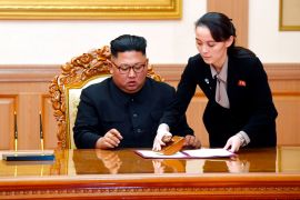 Kim Yo Jong, right, sister of North Korean leader Kim Jong Un, helps Kim sign joint statement following the summit with South Korean President Moon Jae-in at the Paekhwawon State Guesthouse in Pyongyang, North Korea, Wednesday, Sept. 19, 2018. (Pyongyang Press Corps Pool via AP)