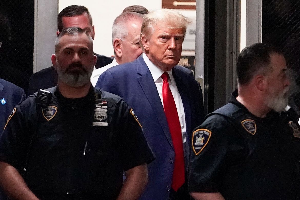 Former President Donald Trump arrives at court