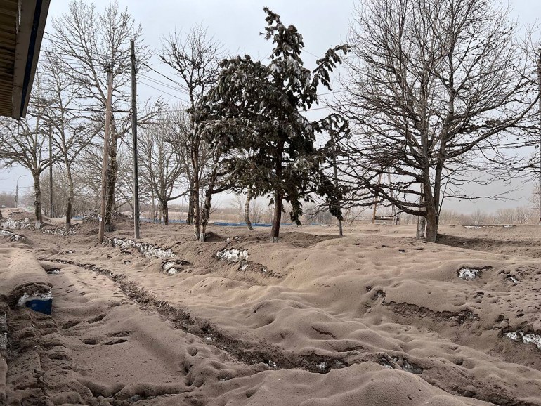 volcanic ash covering the ground in Ust-Kamchatsky district after the Shiveluch volcano's eruption on the Kamchatka Peninsula in Russian far east.