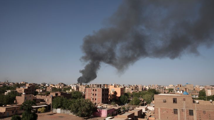 Smoke is seen in Khartoum, Sudan, Wednesday, April 19, 2023. Terrified Sudanese are fleeing their homes in the capital Khartoum, witnesses say, after an internationally brokered cease-fire failed and rival forces battled in the capital for a fifth day. (AP Photo/Marwan Ali)
