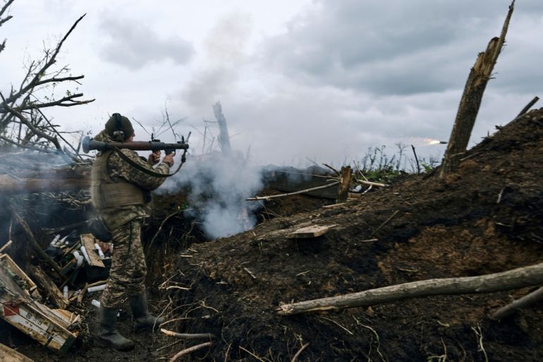 A Ukrainian soldier fires an RPG towards Russian positions at the front line near Avdiivka, an eastern city where fierce battles against Russian forces have been taking place, in the Donetsk region, Ukraine.
