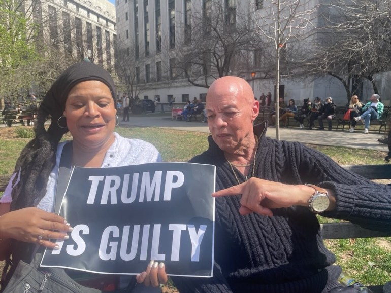 Protesters hold a sign reading, 'Trump is guilty' in New York City