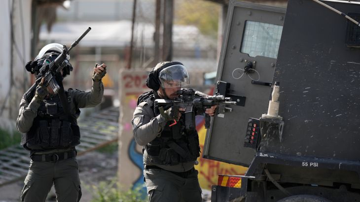Israeli forces take aim