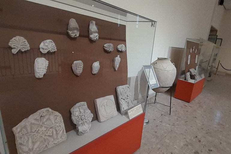 Pre-Islamic artefacts displayed in a glass case