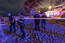 Police officers close off the area where gunfire broke out along a beach promenade in Hollywood, Florida, US, on May 29, 2023 [Cristobal Herrera-Ulashkevich [EPA]