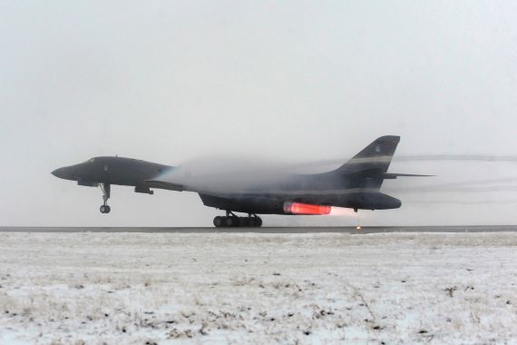 A B-1B Lancer strategic bomber takes off from Ellsworth Air Force Base, in support of Operation Odyssey Dawn in Libya, in this U.S. Air Force handout photo dated March 27, 2011. This mission marked the first time the B-1 fleet has launched combat sorties from the continental United States to strike targets overseas. Picture taken March 27, 2011. REUTERS/U.S. Air Force/Staff Sgt. Marc I. Lane/Handout (UNITED STATES - Tags: MILITARY CONFLICT POLITICS) FOR EDITORIAL USE ONLY. NOT FOR SALE FOR MARKETING OR ADVERTISING CAMPAIGNS. THIS IMAGE HAS BEEN SUPPLIED BY A THIRD PARTY. IT IS DISTRIBUTED, EXACTLY AS RECEIVED BY REUTERS, AS A SERVICE TO CLIENTS