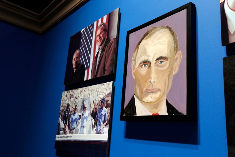 A portrait of Russian President Vladimir Putin, painted by former US President George W Bush, is displayed at "The Art of Leadership: A President's Personal Diplomacy" exhibit at the Bush Presidential Library and Museum in Dallas, Texas April 4, 2014. 
