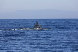 Italian submarine Todaro is seen partly submerged in water