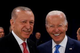 Turkish President Recep Tayyip Erdogan, left, and his US counterpart, Joe Biden, during a NATO summit in Madrid, Spain, on June 29, 2022 [Yves Herman/Reuters]