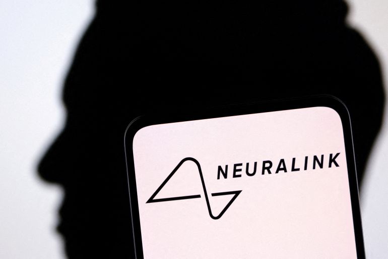 Neuralink logo and Elon Musk silhouette are seen in this illustration taken, December 19, 2022. REUTERS/Dado Ruvic/Illustration