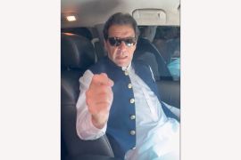 Former Pakistan Prime Minister Imran Khan gestures in a video statement, at an unknown location in Pakistan