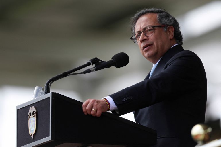 Colombia's President Gustavo Petro speaks at a podium during the ceremony for the new Director of Police in Bogota, Colombia