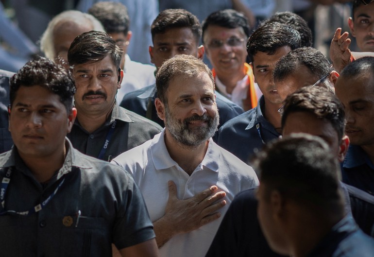 Rahul Gandhi, a senior leader of India's main opposition party, Congress, arrives to address the media after the first polls in the Karnataka elections at the party's headquarters in New Delhi