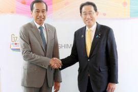 Indonesia's President Joko Widodo holds a bilateral meeting with Japan's Prime Minister Fumio Kishida on the sideline of the G7 leaders' summit in Hiroshima, western Japan