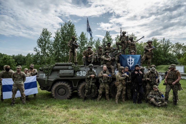 Soldiers of the Russian Volunteer Corps near the Russian border in Ukraine, May 24, 2023. 