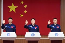 Astronauts Jing Haipeng, Zhu Yangzhu and Gui Haichao attend a press conference before the Shenzhou-16 spaceflight mission [China Daily via Reuters]