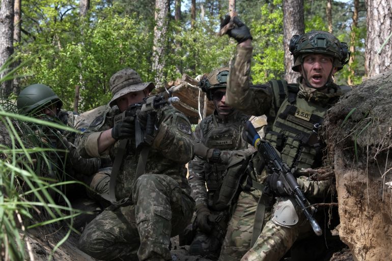 Members of the National Guard of Ukraine take part in military exercises outside Kyiv on May 3, 2023[Sergey Shestak/AFP]