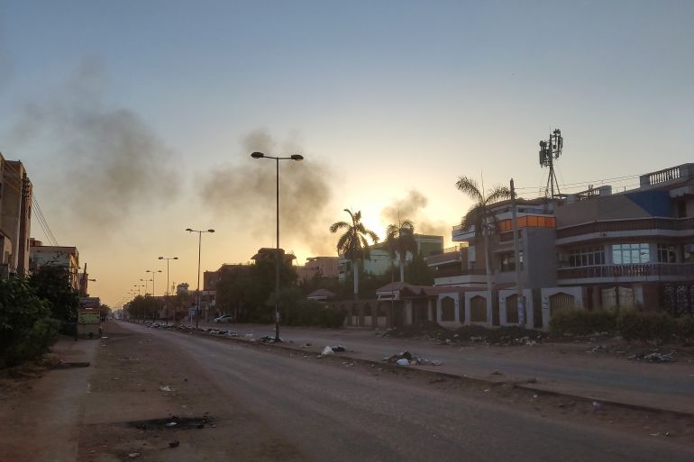 Smoke billows in southern Khartoum amid ongoing fighting between the forces of two rival generals in Sudan on May 6, 2023. - Air strikes battered Sudan's capital on May 6, as fighting entered a fourth week only hours before the warring parties are to meet in Saudi Arabia for their first direct talks. (Photo by - / AFP)