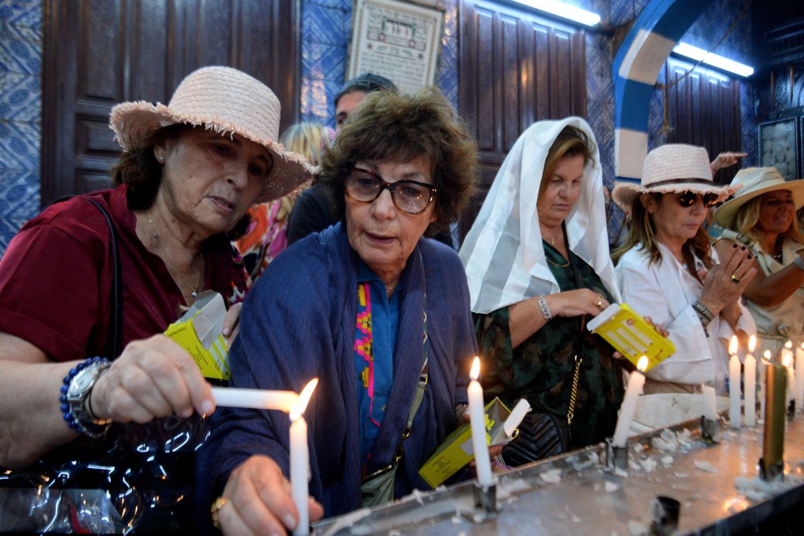 Jewish worshippers light candles at the Ghriba synagogue in Tunisia's southern resort island of Djerba