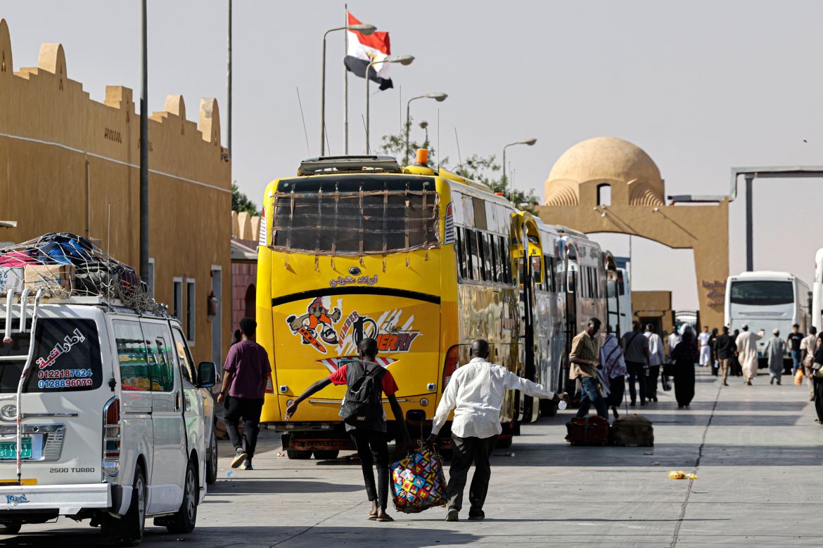Passengers fleeing war-torn Sudan arrive at Qastal land port crossing between Egypt and Sudan