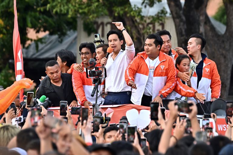 Move Forward Party leader and prime ministerial candidate Pita Limjaroenrat leads a victory parade with fellow party members and supporters in Bangkok, Thailand.
