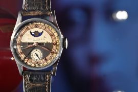 The Patek Philippe Ref 96 Quantieme Lune timepiece once owned by Aisin-Gioro Puyi, the Chinese Qing dynastys last emperor (R), is seen on display in Hong Kong on May 23, 2023 ahead of its auction in the territory on the same day. - The most expensive watch ever sold at auction was a super-complicated Patek Philippe Grandmaster Chime, which sold for US$31 million in 2019. (Photo by Peter PARKS / AFP)