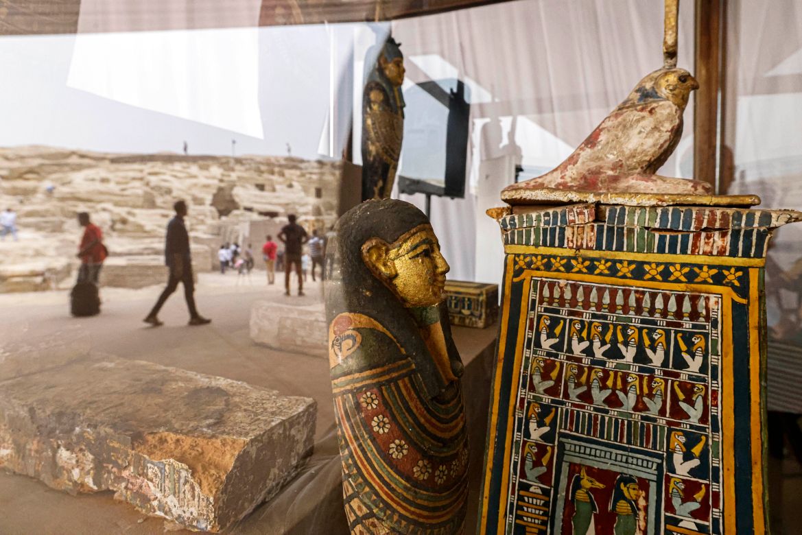 Newly discovered ancient objects are displayed at the Saqqara necropolis