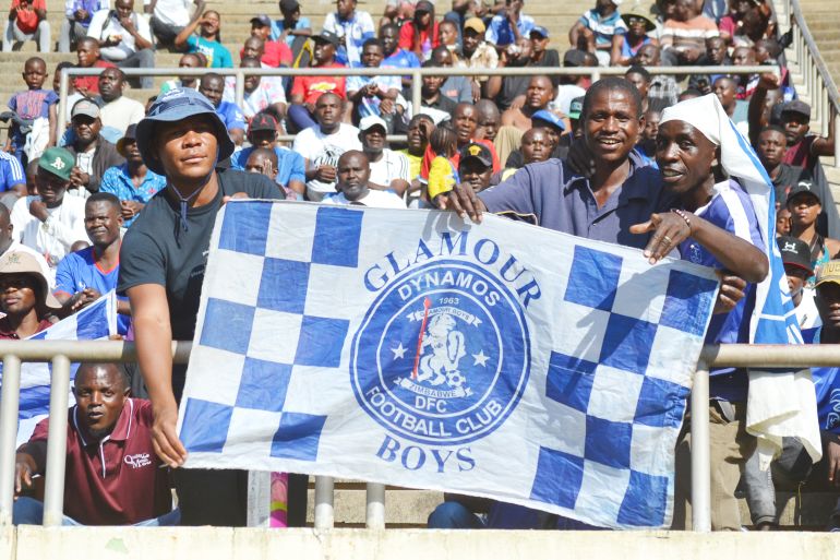 Dynamos FC fans hold up a banner reading 'Glamour Boys' at the Harare Derby