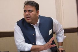 In this Tuesday, Sept. 25, 2018 photo, Pakistani Information Minister Fawad Chaudhry speaks to The Associated Press, in Islamabad, Pakistan. The Ahmadiyya minority fears heightened persecution after the new government bowed to demands from Islamic hard-liners to rescind the appointment of a U.S.-based Ahmadi professor to an economic advisory council. Chaudhry sought to stem the controversy by pointing out that the position had nothing to do with religion or lawmaking, and that the newly elected government wanted to be inclusive. (AP Photo/B.K. Bangash)