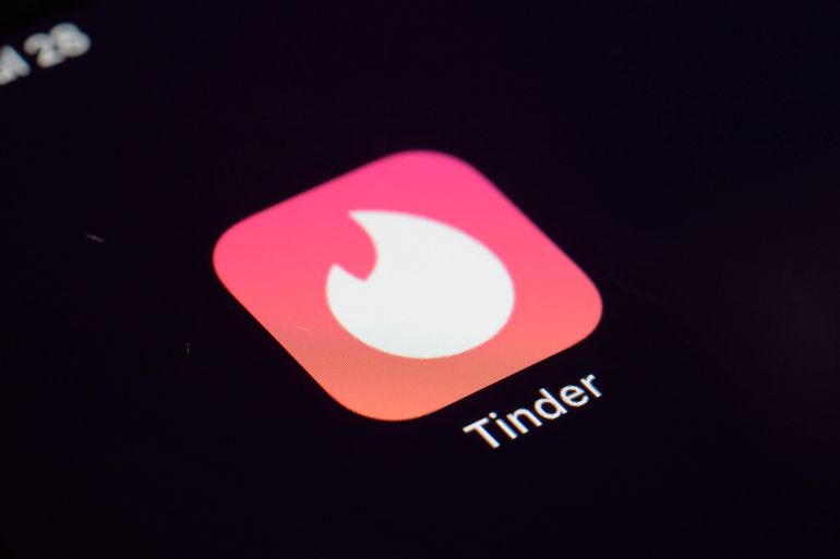 The icon for the Tinder dating app appears on a device in New York, US
