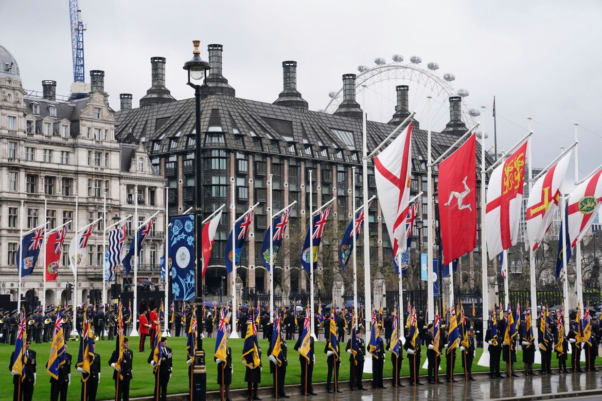 Standard bearers and members of the military in Parliament Square ahead of the coronation ceremony of King Charles III.