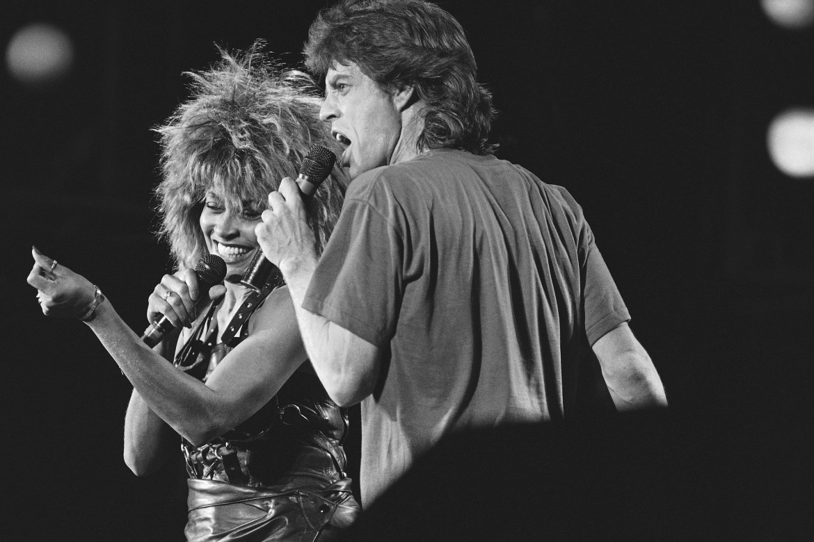 Singer Tina Turner, left, and Mick Jagger perform together during Live-Aid concert on July 14, 1985