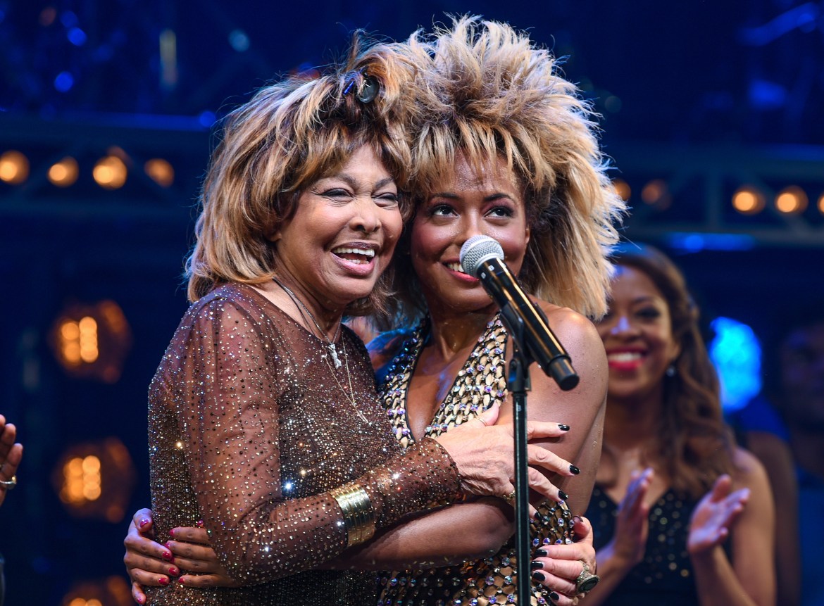 Singer Tina Turner, left, appears on stage with actress Adrienne Warren