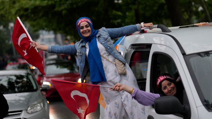 Supporters of the Turkish President Recep Tayyip Erdogan celebrate at AK Party offices in Istanbul, Turkey, Sunday, May 28, 2023.