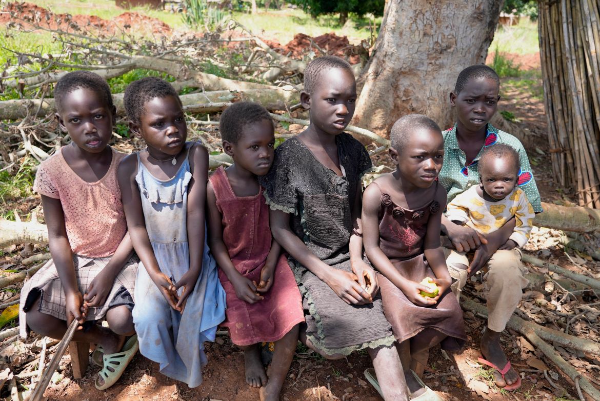 Children listen as they are educated about about the risks of unexploded mines,