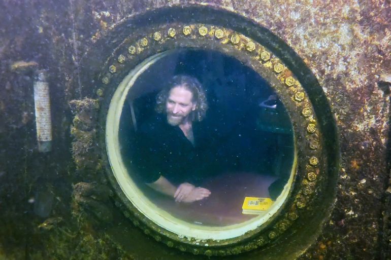 The professor stares out of his underwater window