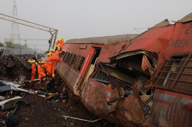The National Disaster Response Force at the site of a train accident in Balasore
