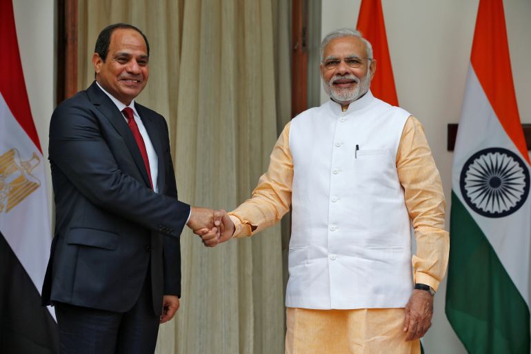 Egypt's President Abdel Fattah al-Sisi (L) shakes hands with India's Prime Minister Narendra Modi during a photo opportunity at Hyderabad House in New Delhi, India, September 2, 2016.