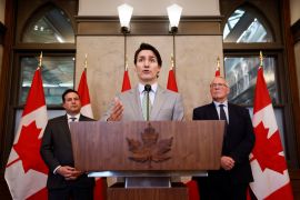 Canada&#39;s Prime Minister Justin Trudeau, with Minister of Public Safety Marco Mendicino and Minister of Emergency Preparedness Bill Blair, holds a press conference in response to the release of a special report on foreign interference, on Parliament Hill in Ottawa, Ontario, Canada May 23, 2023 [Blair Gable/Reuters]