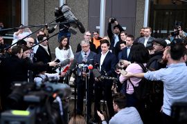 Journalists Nick McKenzie and Chris Masters, who reported on the soldier&#39;s alleged war crimes, give a statement outside the Federal Court, in Sydney [AAP Image/Dan Himbrechts via Reuters]