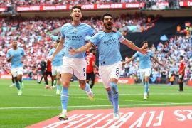 Soccer Football - FA Cup Final - Manchester City v Manchester United - Wembley Stadium, London, Britain - June 3, 2023 Manchester City&#39;s Ilkay Gundogan celebrates scoring their second goal with John Stones REUTERS/Carl Recine TPX IMAGES OF THE DAY