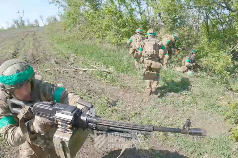 Ukrainian servicemen of the 3rd Assault Brigade move at their position on the front line in Bakhmut direction, Donetsk region, Ukraine, in this screengrab obtained from a social media video released on June 6, 2023. 3rd Assault Brigade/Ukrainian Armed Forces Press Service via REUTERS ATTENTION EDITORS - THIS IMAGE HAS BEEN SUPPLIED BY A THIRD PARTY. MANDATORY CREDIT. NO RESALES. NO ARCHIVES. REUTERS WAS NOT ABLE TO INDEPENDENTLY VERIFY THE LOCATION OF THE VIDEOS OR WHEN THE VIDEOS WERE FILMED.