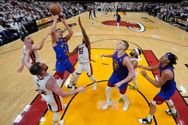 Jun 7, 2023; Miami, Florida, USA; Denver Nuggets forward Michael Porter Jr. (1) shoots the ball against the Miami Heat during the second half in game three of the 2023 NBA Finals at Kaseya Center. Mandatory Credit: Wilfredo Lee/Pool Photo-USA TODAY Sports