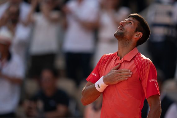 Jun 9 2023; Paris,France; Novak Djokovic (SRB) celebrates winning his semifinal match against Carlos Alcaraz (ESP) day 13 at Stade Roland-Garros.