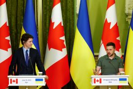 Canadian Prime Minister Justin Trudeau, left, and Ukraine&#39;s President Volodymyr Zelenskyy attend a press conference in Kyiv on Saturday [Valentyn Ogirenko/Reuters]