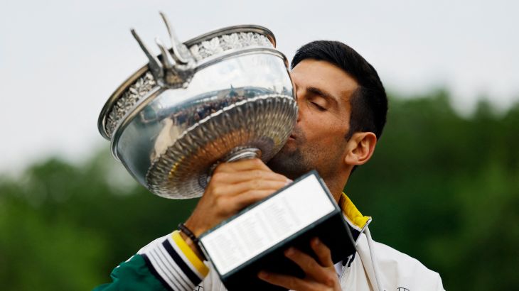 Djokovic kisses the French Open trophy